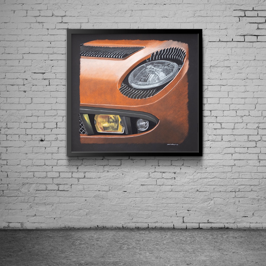 La pared de un garaje con un cuadro del Lamborghini Miura